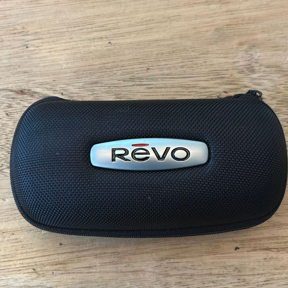 Revo hard sunglass zip around case. Black fleece lining